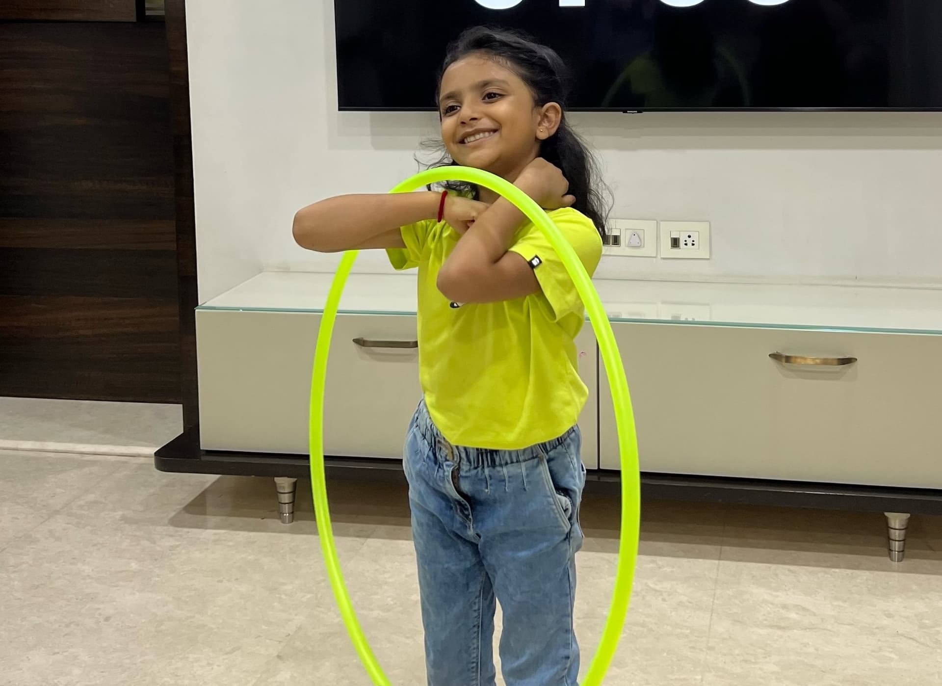 Most Hula Hoops Passed Between Elbows