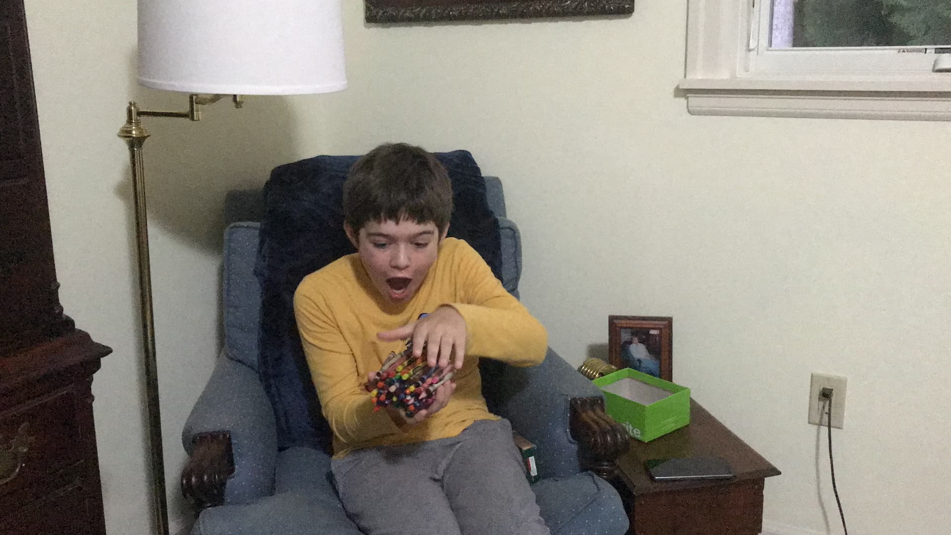 Most Crayons Held In One Hand