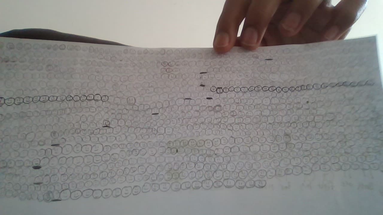 Smiley Faces On a Sheet of Paper