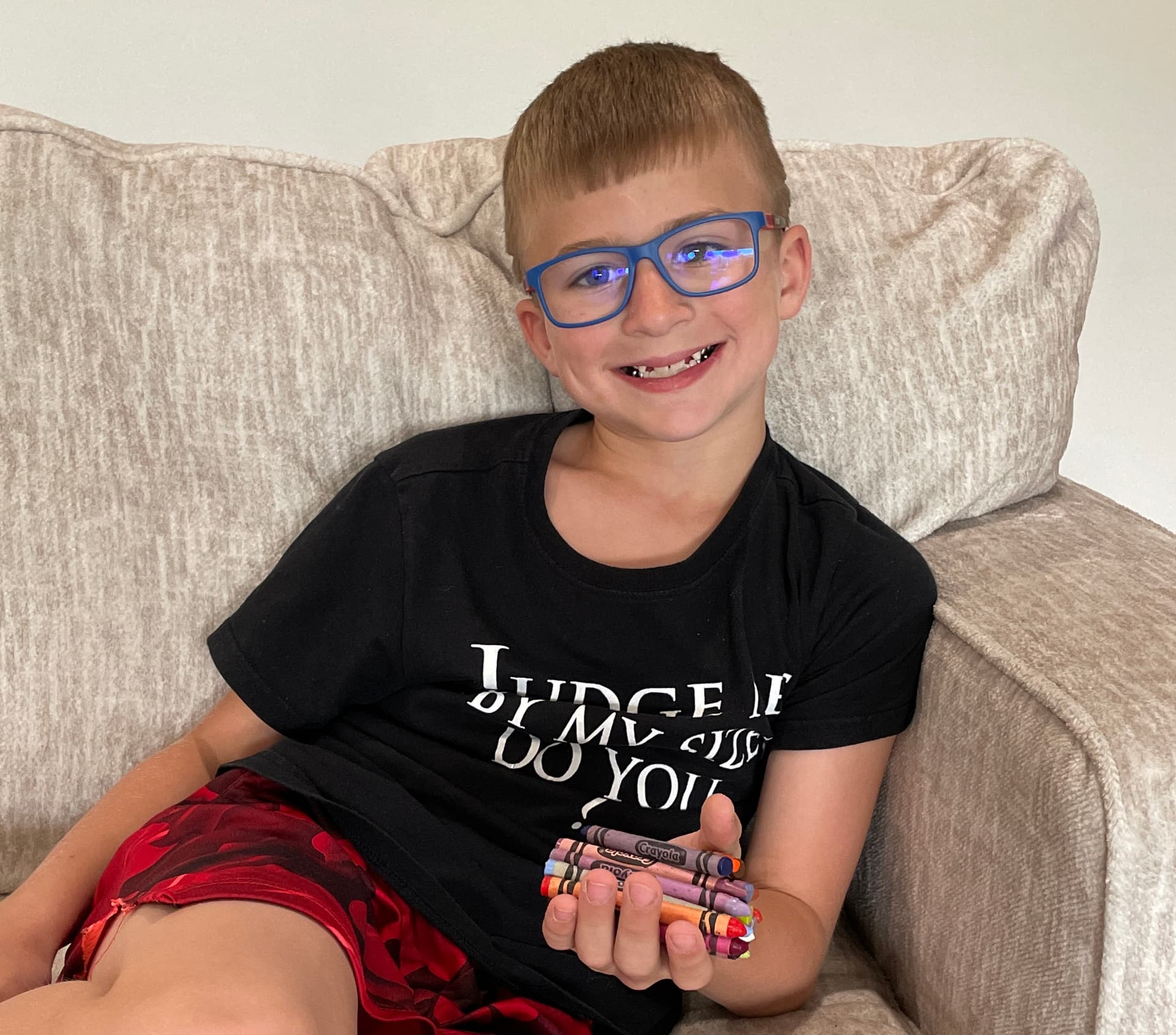 Most Crayons Held In One Hand