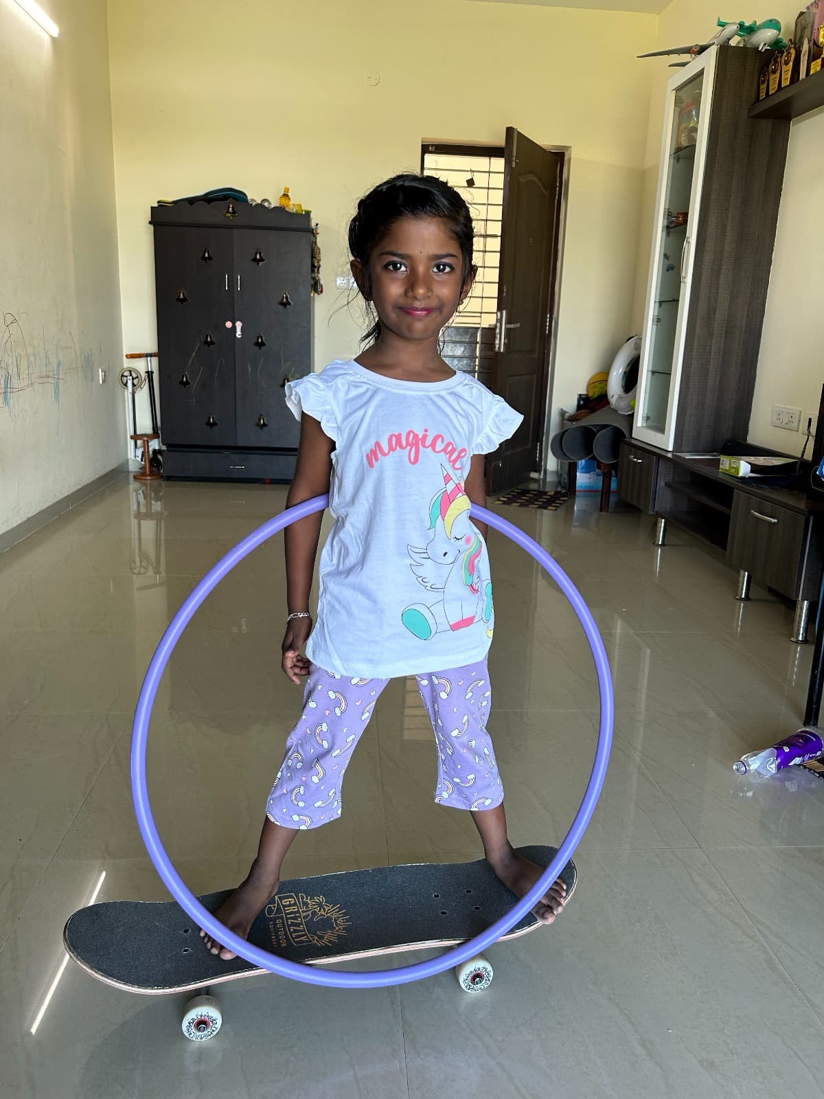 Longest Time Hula Hooping on a Skateboard
