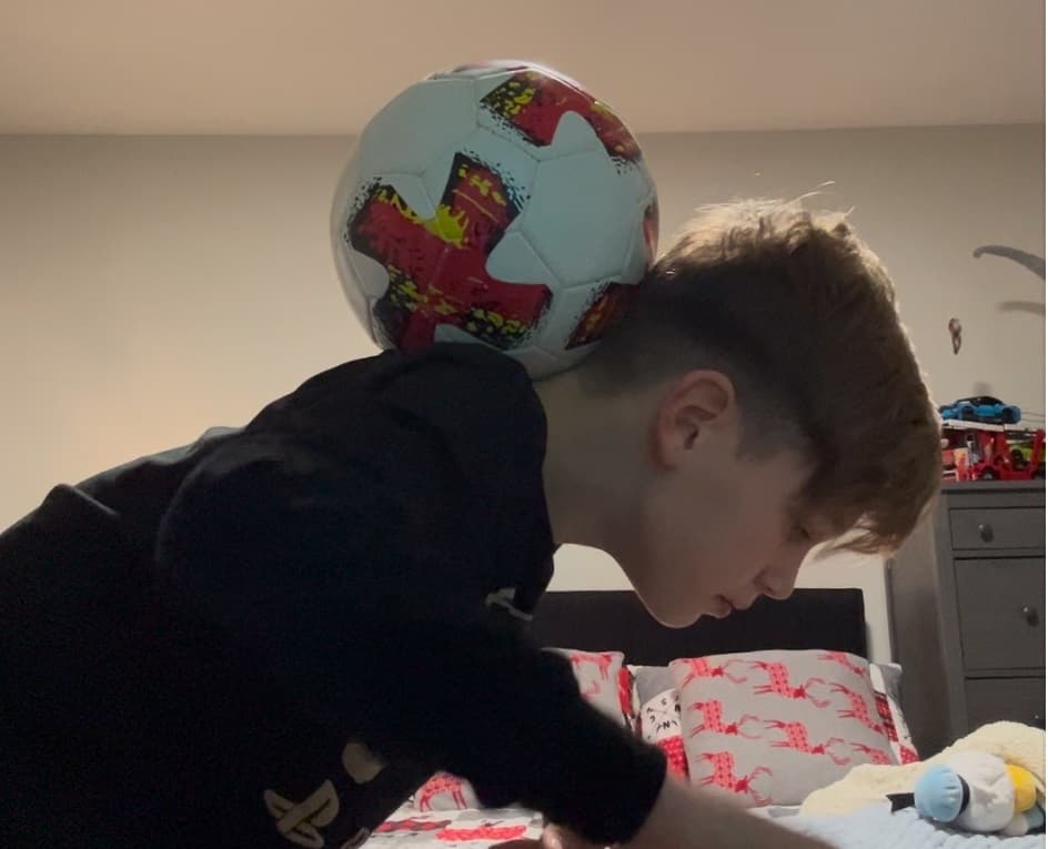 Longest Time Balancing a Soccer Ball on the Back of the Neck