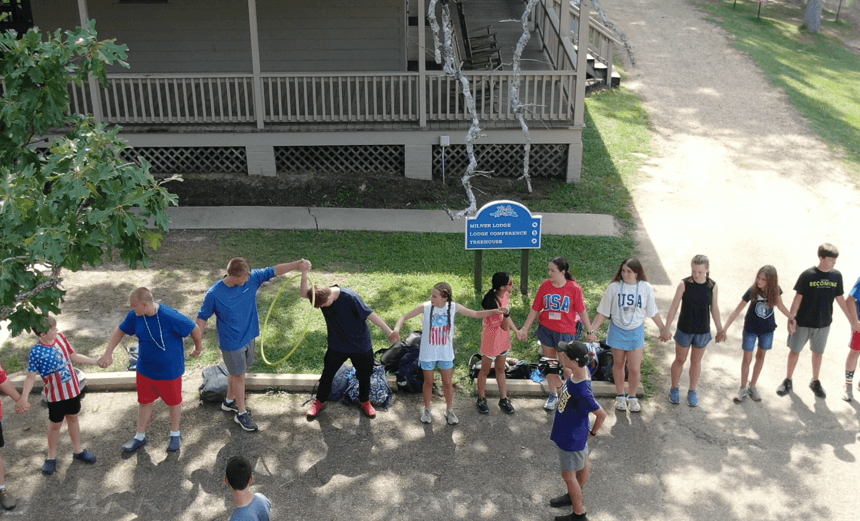 Most Kids Doing a Hula Hoop Relay