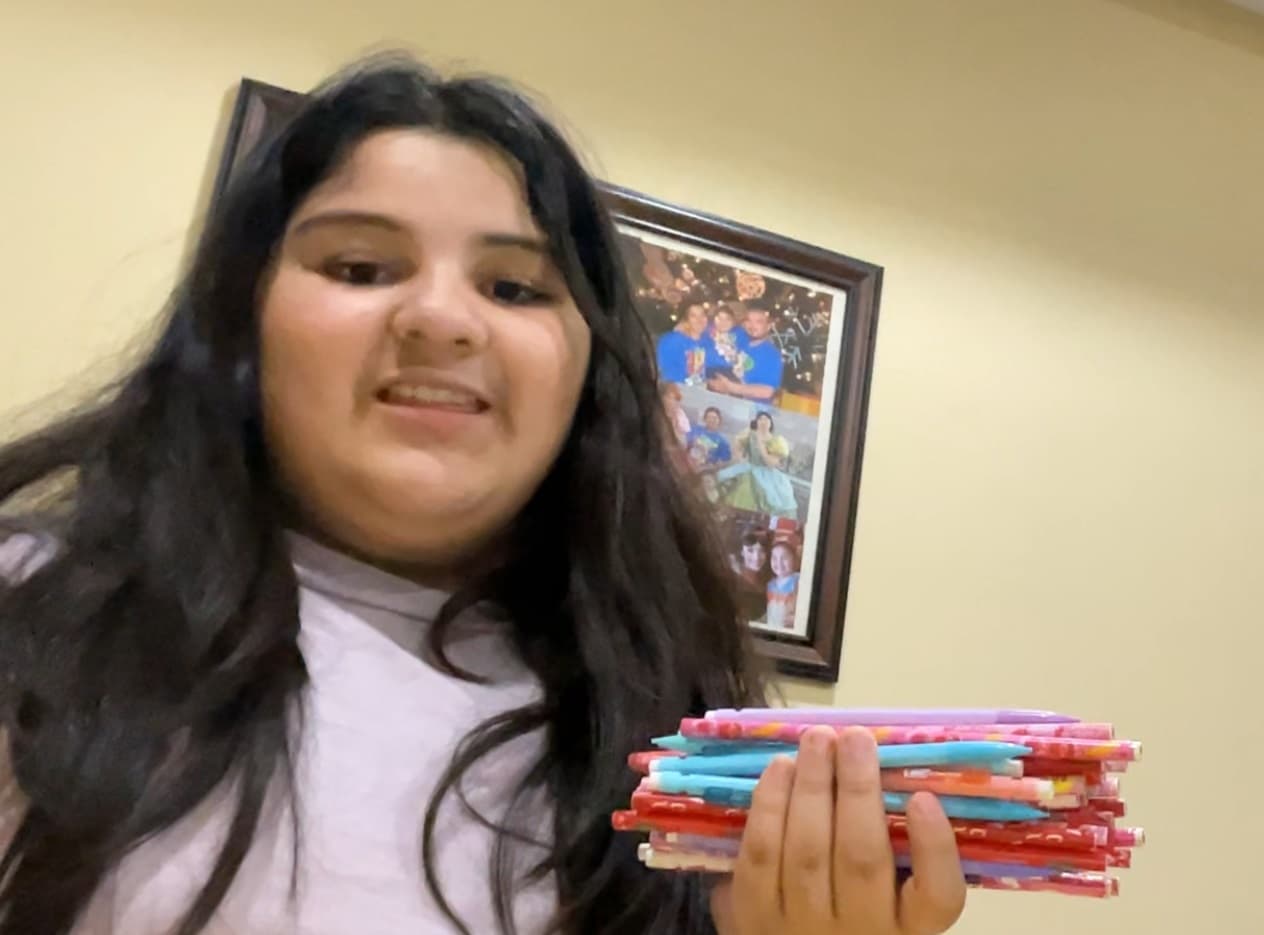 The Most Pens Held in One Hand