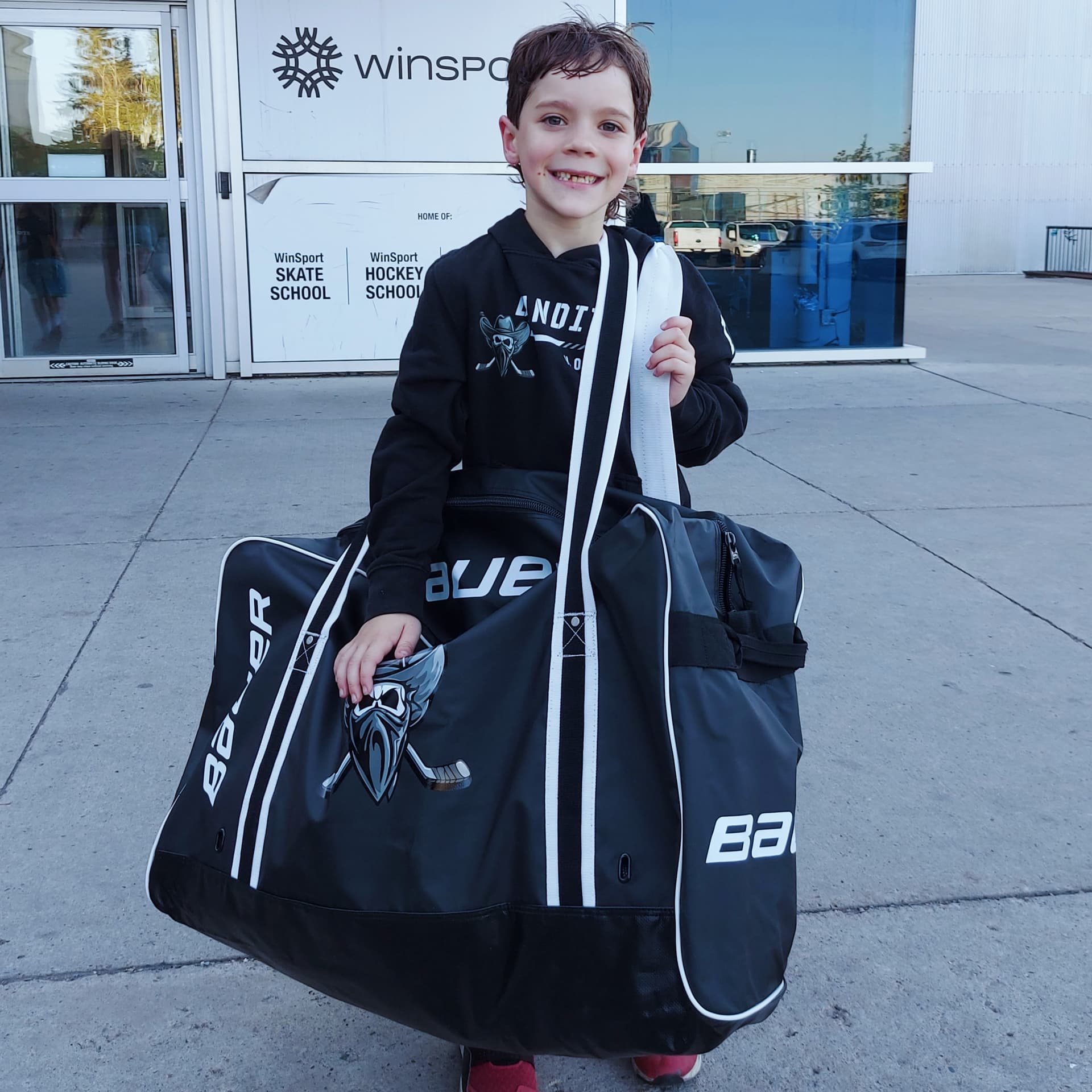 Fastest Time Picking Up A Puck With a Hockey Stick and Flipping It Into A Basket
